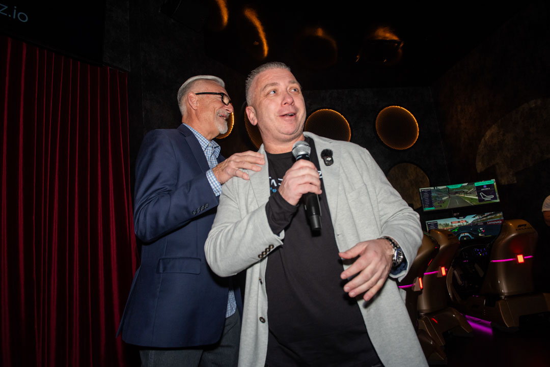 Data Driverz founder speaking on the microphone at a company event